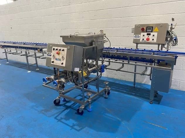 Model 1000 Twin Track Indexing + Depositing Line