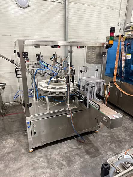 Alphapack bottle sorting, filling and capping system