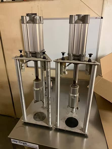 2x SMC table-top pneumatic capping machines